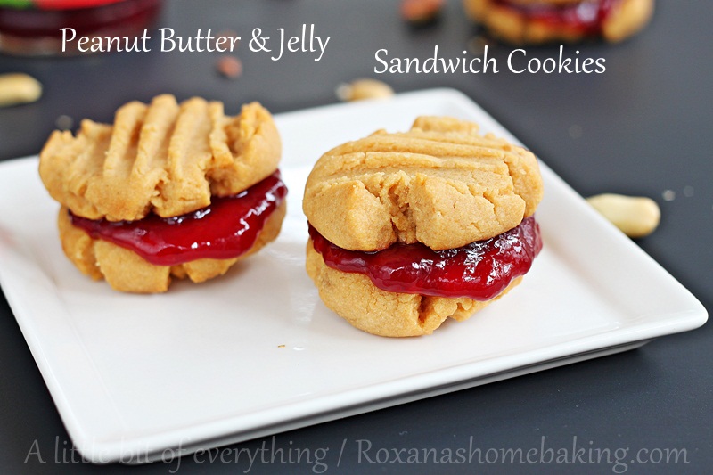 Soft melt-in-your-mouth Peanut Butter cookies sandwiched with berry jelly - Classic peanut butter jelly just got a make-over. Recipe from Roxanashomebaking.com