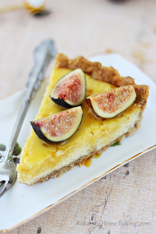 A creamy, sweet ricotta tart brushed with honey and decorated with flagrant fresh figs. Recipe from roxanashomebaking.com