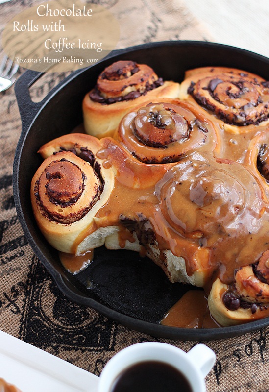 Soft buttery brioche rolls filled with chocolate and drizzled with coffee cream cheese icing. Great at breakfast time with a cup of tea/coffee or even with some cold milk. Recipe from Roxanashomebaking.com