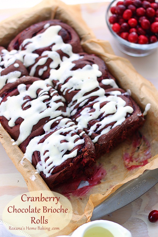 Cranberry Chocolate Brioche Rolls from Roxanashomebaking.com Soft and slightly sweet chocolate brioche filled with tart cranberry sauce and topped with sweet cream cheese icing.