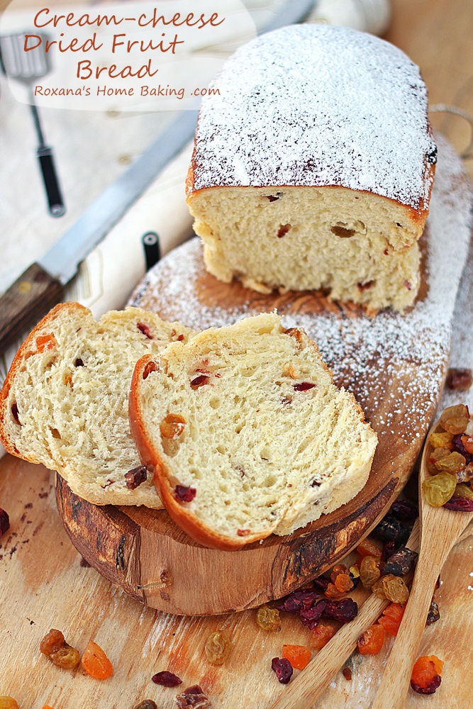 Sweet, soft and fluffy yeast dried fruit bread made with cream cheese and dusted with powder sugar for Christmas breakfast or brunch