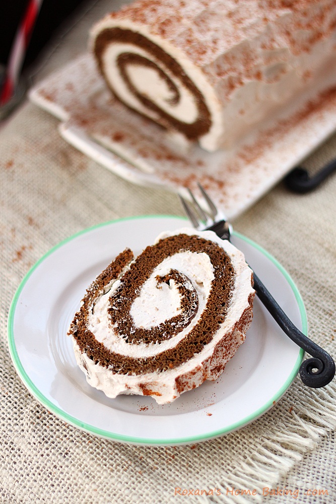 Moist gingerbread roll cake filled with spiced creamy filling from Roxanashomebaking.com 