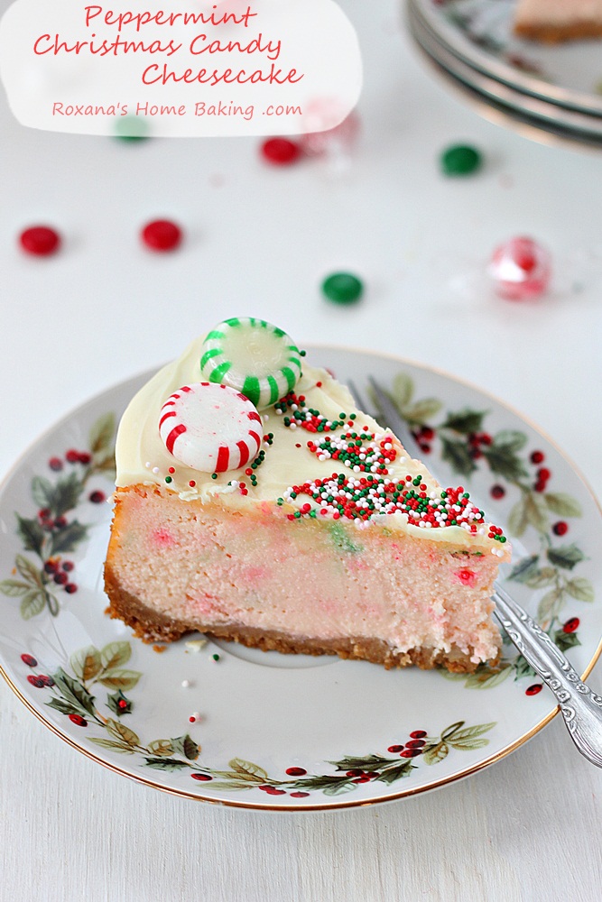Velvety ricotta cheesecake mixed with crushed peppermint candy and topped with a layer of white chocolate ganache, Christmas candy and sprinkles.