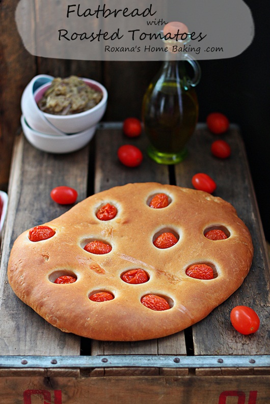 Flatbread with roasted tomatoes - easy to make and full of flavor from the tomatoes which are roasting while the bread bakes. 