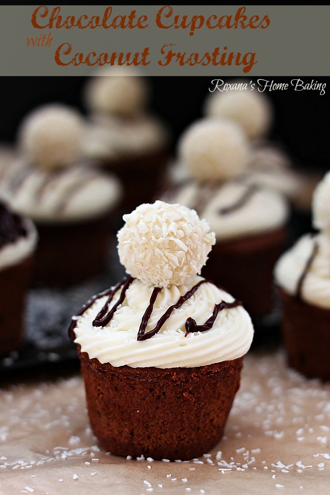 Chocolate cupcakes flavored with Almond Joy coffee creamer and topped with silky smooth coconut frosting and a Raffaello Almond Coconut candy from Roxanashomebaking.com