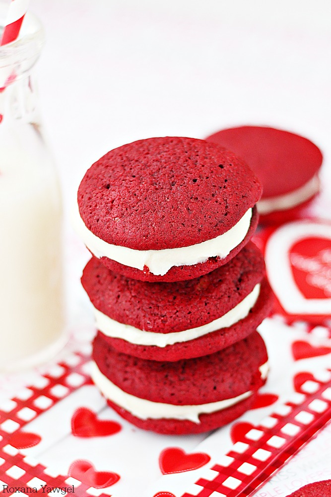 Red velvet whoopie pies with cream cheese frosting - Soft, cake-like red velvet cookies sandwiched with a smooth sweet cream cheese frosting