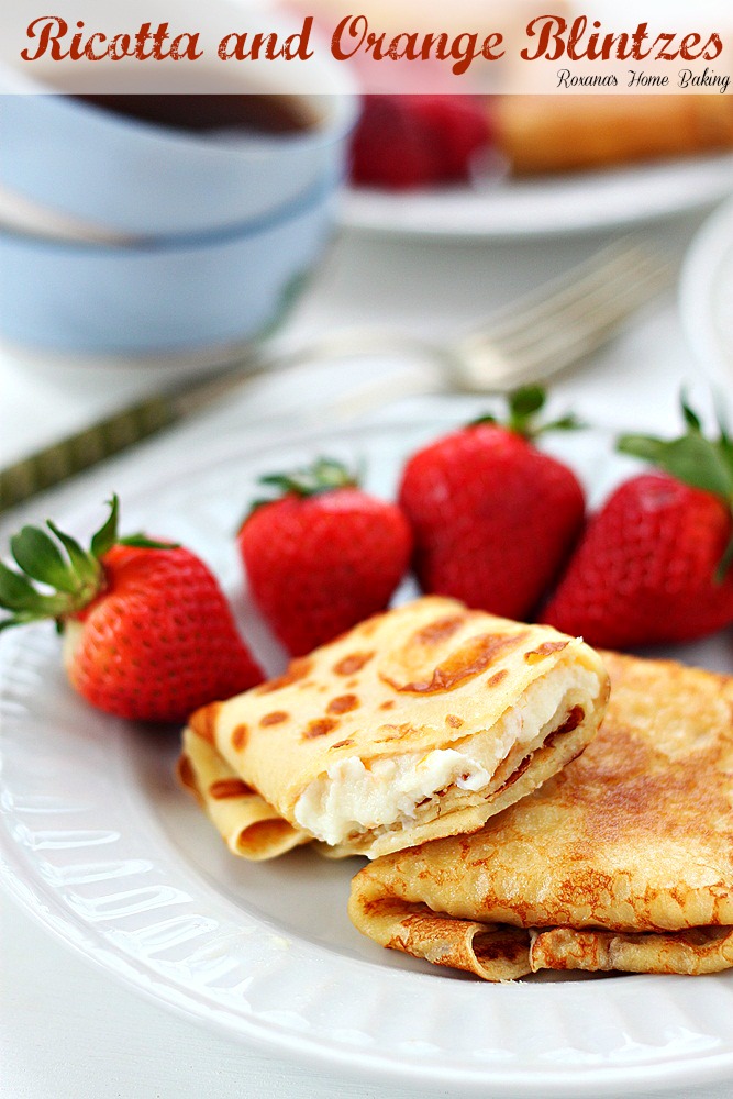 Ricotta and orange blintzes from Roxanashomebaking.com Thin crepes filled with sweet ricotta with a touch of orange 