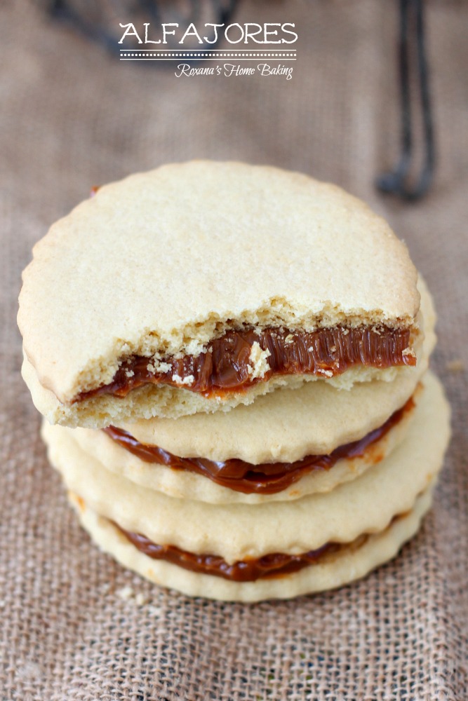 Alfajores, also known as dulce de leche sandwich cookies, are traditional shortbread cookies with a dulce de leche filling. Recipe from Roxanashomebaking.com