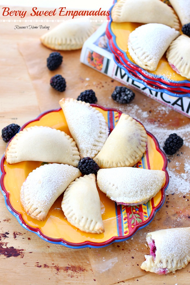 Flaky pastry pockets filled with creamy ricotta and a juicy blackberry from Roxanashomebaking.com A sweet twist on traditional empanadas.  