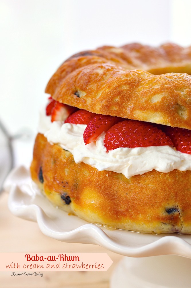 Baba au Rhum from Roxanashomebaking.com A bundt no knead rich yeast coffee cake with dried fruit, soaked in rum syrup and filled with whipped cream and fresh strawberries