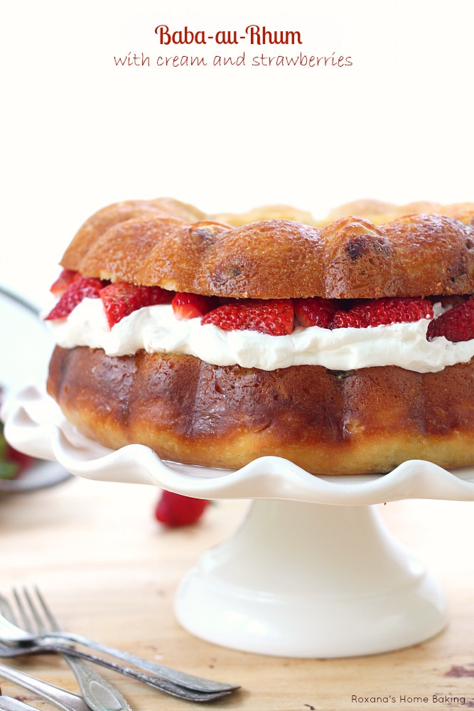 Baba au Rhum from Roxanashomebaking.com A bundt no knead rich yeast coffee cake with dried fruit, soaked in rum syrup and filled with whipped cream and fresh strawberries