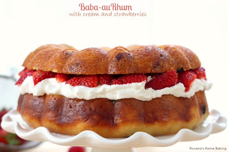 Baba au Rhum from Roxanashomebaking.com A bundt no knead rich yeast coffee cake with dried fruit, soaked in rum syrup and filled with whipped cream and fresh strawberries