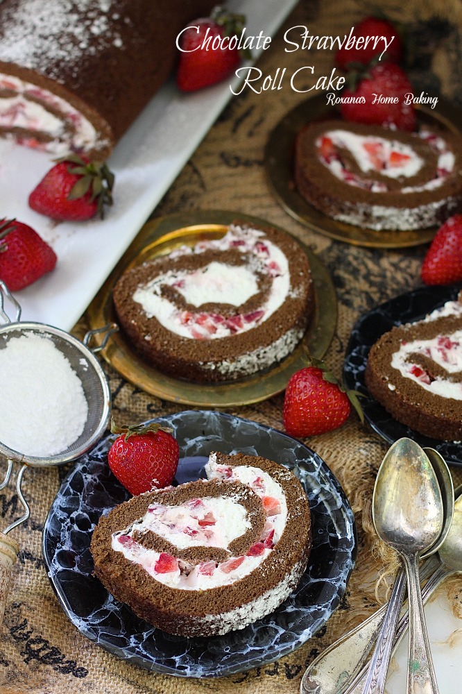 Chocolate sponge cake filled with lighter than air cream and diced fresh strawberries. Recipe from Roxanashomebaking.com #chocolateparty