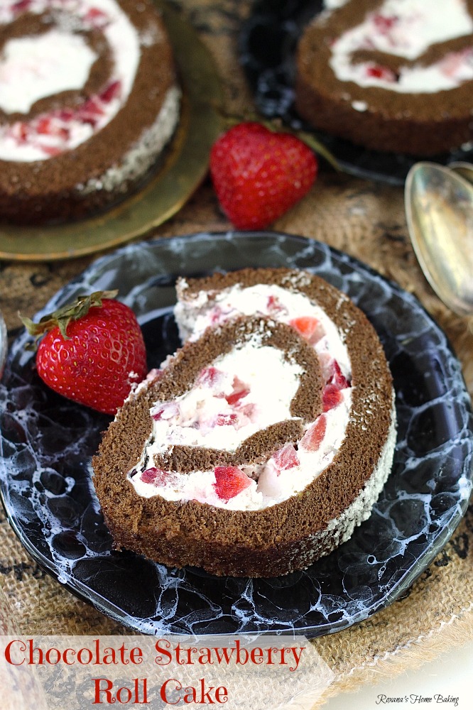 Chocolate sponge cake filled with lighter than air cream and diced fresh strawberries. Recipe from Roxanashomebaking.com #chocolateparty