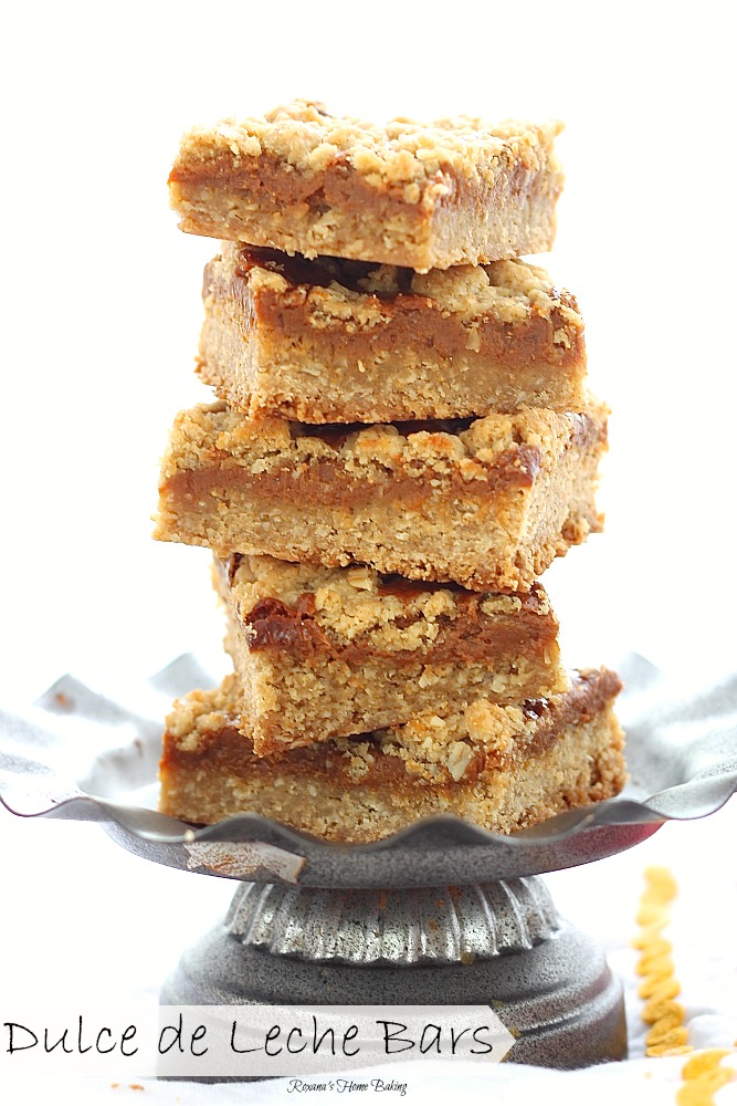 Quick and easy oatmeal bars with a thin layer of chewy gooey dulce de leche. Recipe from Roxanashomebaking.com