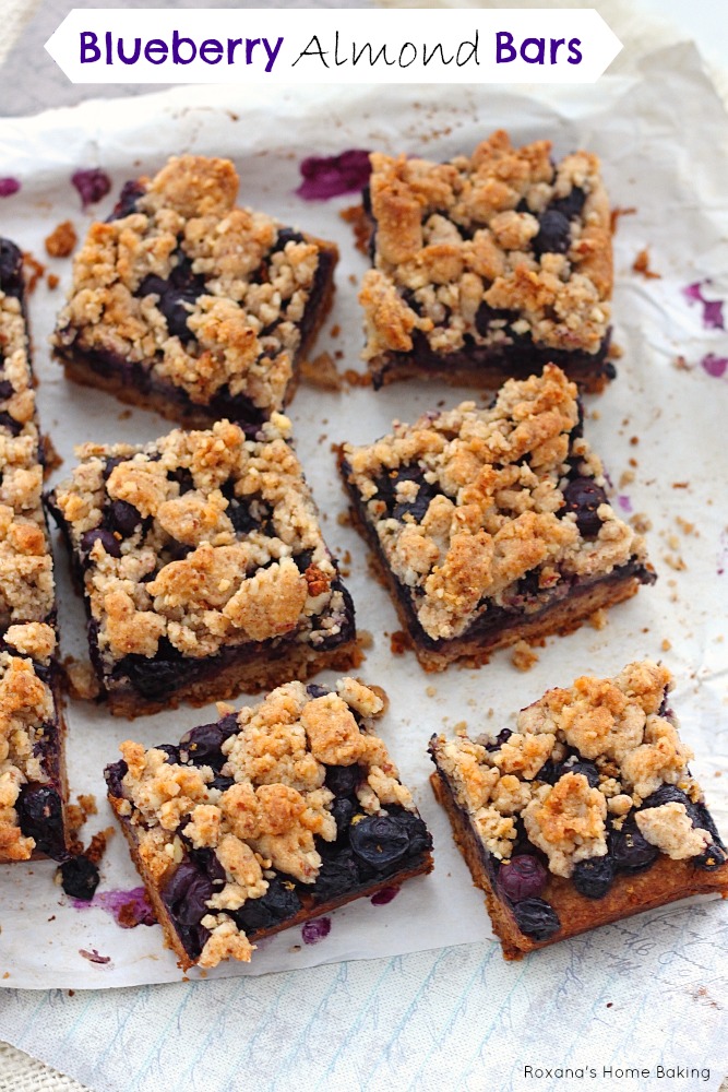 Blueberry almond bars from Roxanashomebaking.com  Buttery cookie almond base topped with a layer of sweet and juicy blueberries and crumbled topping. A great way to enjoy both fruit and nuts in one bite.