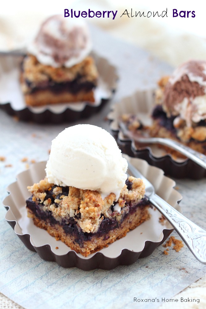 Blueberry almond bars from Roxanashomebaking.com  Buttery cookie almond base topped with a layer of sweet and juicy blueberries and crumbled topping. A great way to enjoy both fruit and nuts in one bite.