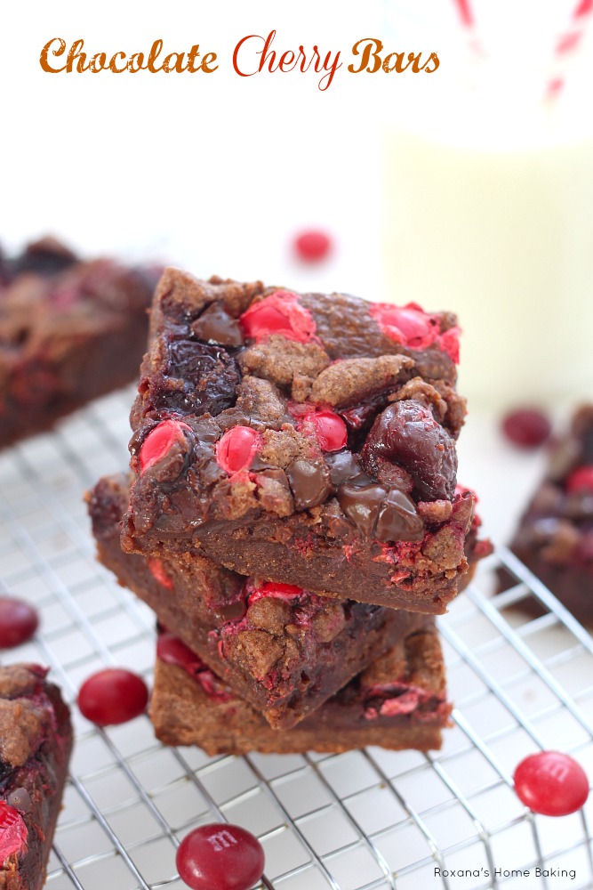 Chocolate cookie base, rich chocolate fudge, cherries and cherry flavored M&M's - all in one irresistible bar!  Recipe from Roxanashomebaking.com