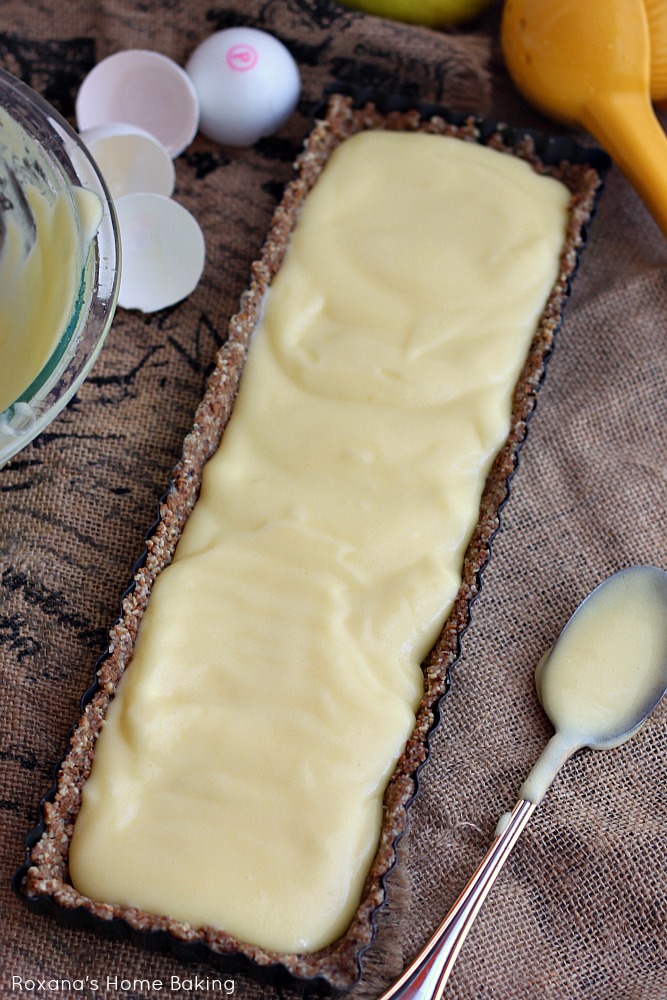 Tangy lemon juice and zest pair perfectly with the nutty crust in this creamy lemon curd tart, made lighter with the addition of a secret ingredient. Recipe from Roxanashomebaking.com