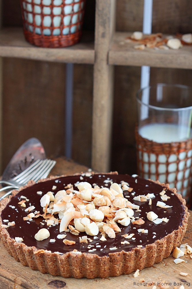 Chocolate ganache coconut tart  - flaky almond tart crust filled with silky, decadent chocolate coconut ganache. 