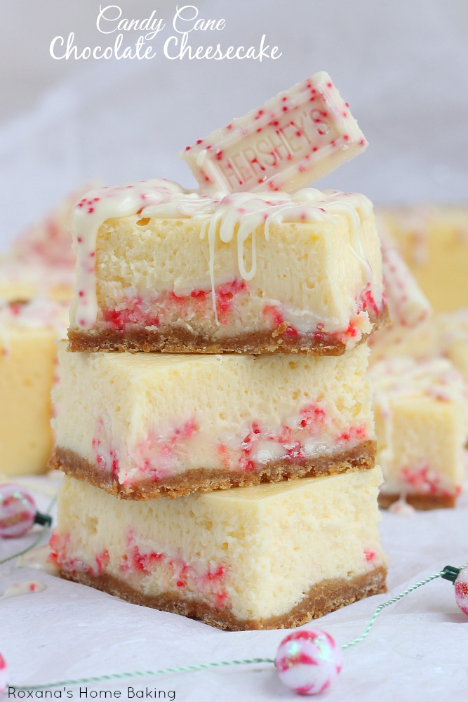Velvety peppermint cheesecake with swirls of white chocolate candy cane bars. A holiday showstopper dessert 