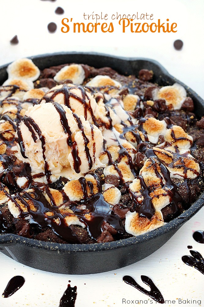 Triple chocolate smores pizookie baked in a skillet and topped with ice-cream - heaven in every bite!