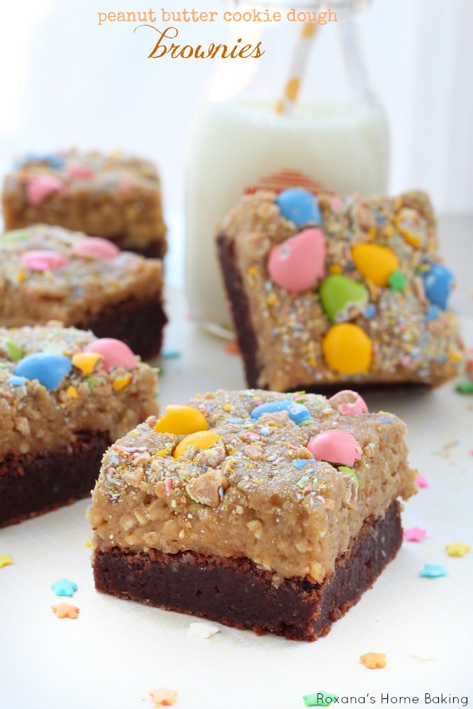 These peanut butter cookie dough brownies feature fudgy homemade brownies topped with a thick layer of creamy peanut butter cookie dough and colorful candy. 