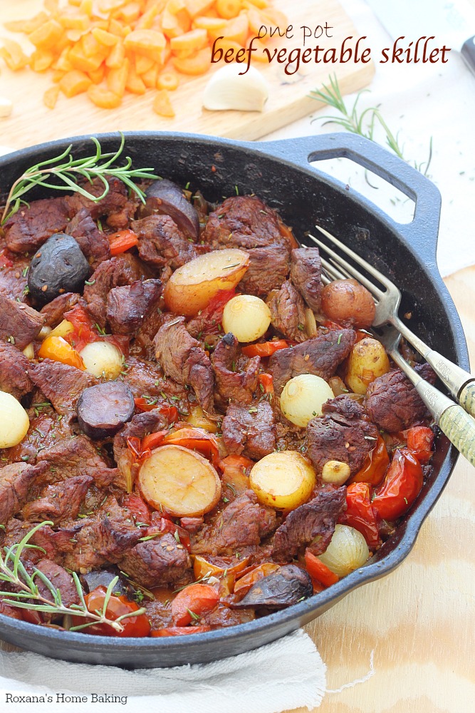 A simple yet satisfying dinner, this one pot beef vegetable skillet has incredible flavors from the carrots, celery, potatoes slow baked in a red wine and tomato sauce