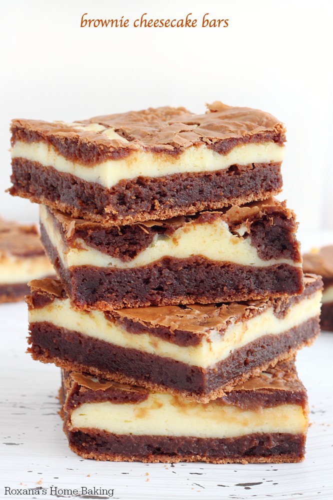 Chewy,  fudgy brownies swirled with creamy cheesecake in these hard to resist cheesecake brownie bars! Have a glass of milk near by to wash down all their richness.