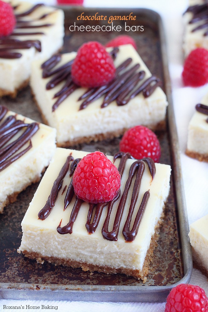 Looking for irresistible cheesecake bars without most of the fuss? These cheesecake bars fit the bill! A simple graham cracker crust topped with a luscious cheesecake and finished with a drizzle of chocolate ganache.