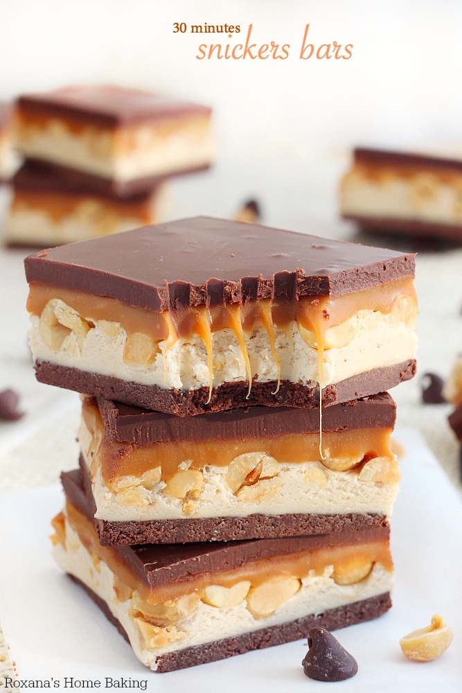 Nougat, peanuts and caramel sandwiched between two chocolate layers, these homemade snickers bars come together in 30 minutes tops! Faster than going to the store to buy some!