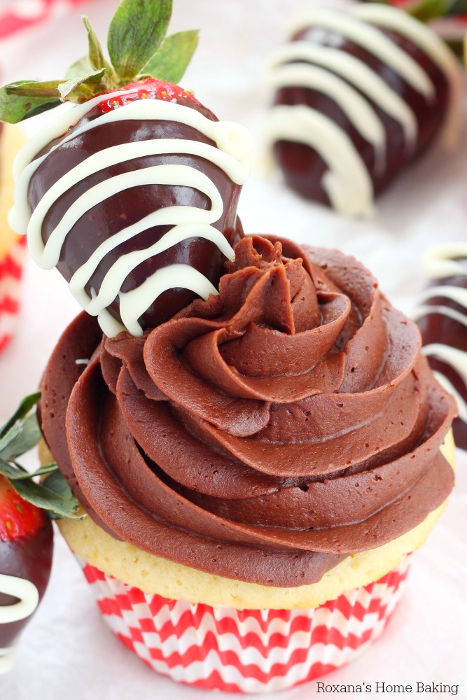Chocolate and strawberry are a match made in heaven and these delicious, colorful, pretty-looking chocolate dipped strawberry surprise cupcakes are the perfect dessert to satisfy your sweet tooth's cravings! 