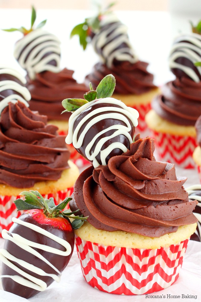 Chocolate and strawberry are a match made in heaven and these delicious, colorful, pretty-looking chocolate dipped strawberry surprise cupcakes are the perfect dessert to satisfy your sweet tooth's cravings! 