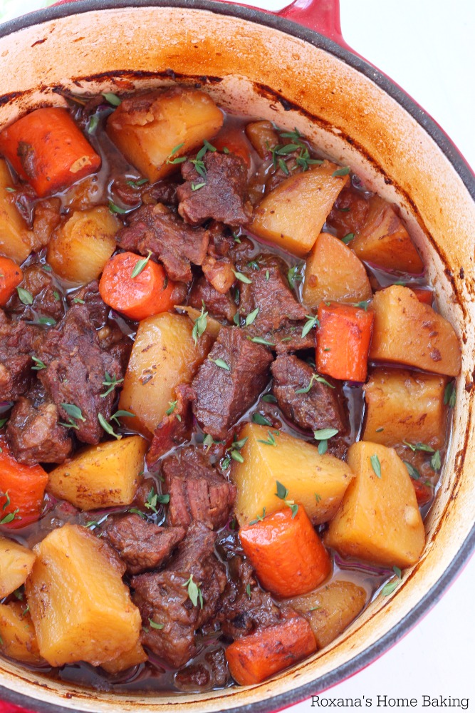 Flavorful beer braised beef with carrots and potatoes, cooked slow and low in the oven is an effortless weeknight meal. One bite of this tender, juicy, tad spicy beef is going to send you over the moon. 