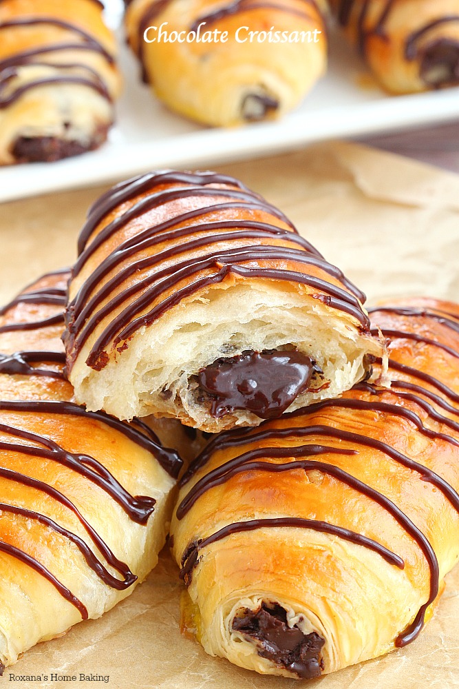 Layer upon layer of light, buttery flaky pastry filled with rich chocolate and drizzled with more chocolate, these made from scratch chocolate croissants are simply mind-blowing! No butter folding or chilling the dough several times needed! 