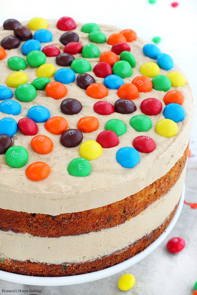 Peanut butter cake loaded with chopped Peanut Butter M&M's and a dreamy peanut butter frosting, this cake is a peanut butter lover dream come true!