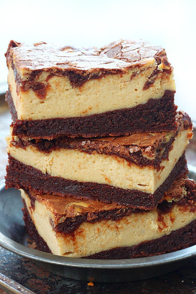 Fudgy homemade brownie topped with a silky layer of peanut butter cheesecake. If you love peanut butter and chocolate together, you'll LOVE these peanut butter cheesecake brownies! 