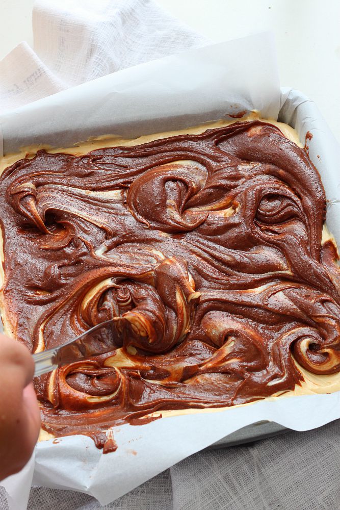 Fudgy homemade brownie topped with a silky layer of peanut butter cheesecake. If you love peanut butter and chocolate together, you'll LOVE these peanut butter cheesecake brownies! 