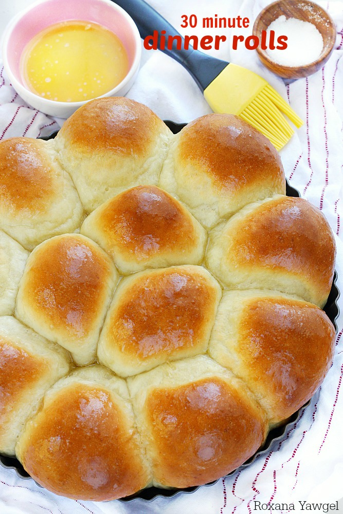 Flour, yeast, butter and milk is all you need to create these soft and fluffy dinner rolls in less than half an hour! These foolproof 30 minute dinner rolls are so easy to make you'll never go store-bought again!