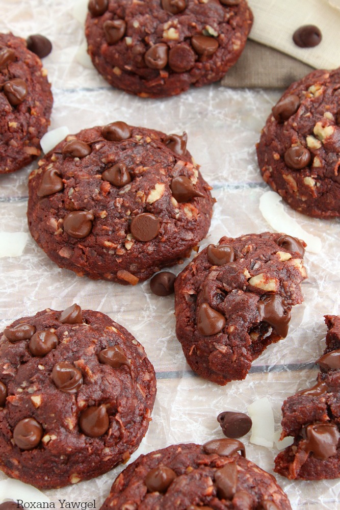 Thick, puffy and pillowy soft, fudgy and oozing with chocolate, these coconut pecans chocolate chocolate chip cookies will make you weak at the knees!