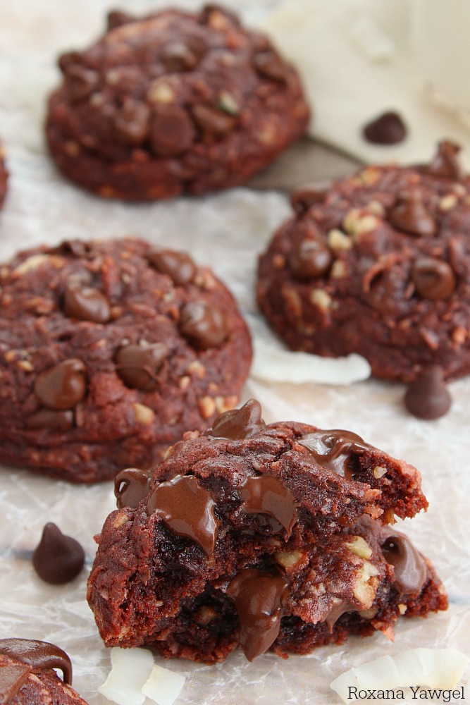 Thick, puffy and pillowy soft, fudgy and oozing with chocolate, these coconut pecans chocolate chocolate chip cookies will make you weak at the knees!