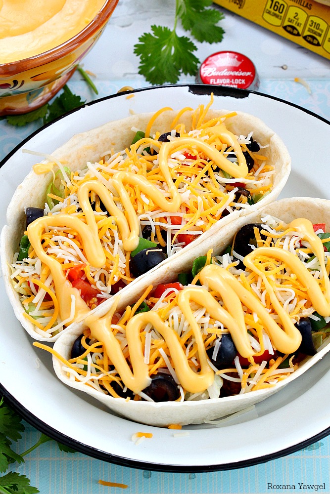 No matter what team are you on, you'll be a winner once you share these beef taco boats with beer cheese sauce at the Super Bowl party!