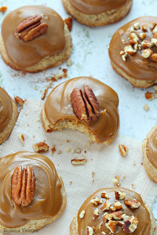 Soft brown sugar pecan cookies topped with a luscious rich brown sugar frosting! Grab a glass of cold milk! It's required with these cookies!