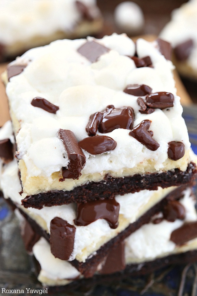 So amazingly easy to prepare, these gooey fudgy brownie bars will leave everyone drooling! Fudgy brownie, creamy cheesecake, gooey marshmallows and oozing chocolate - what's not to love? 