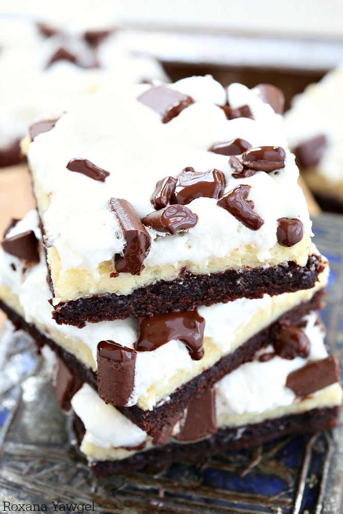 So amazingly easy to prepare, these gooey fudgy brownie bars will leave everyone drooling! Fudgy brownie, creamy cheesecake, gooey marshmallows and oozing chocolate - what's not to love? 