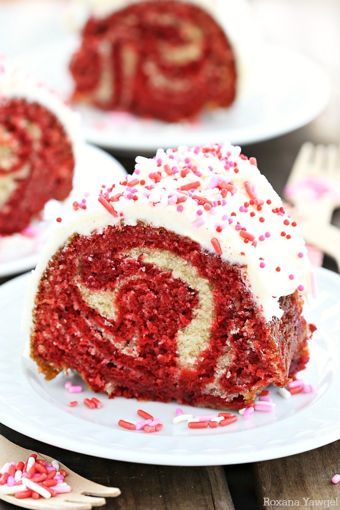 With the right amount of buttermilk and vanilla extract, and cocoa powder added to the red swirl, this made from scratch white and red velvet cake will make everyone's heart sing! 