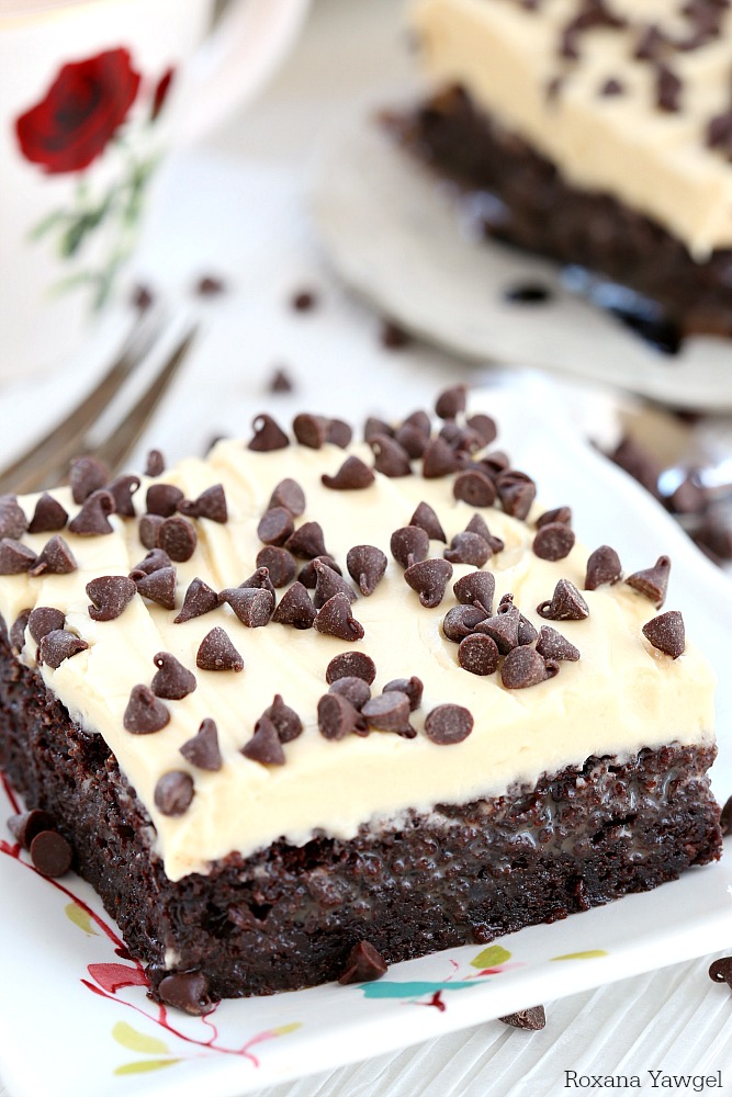 Rich Irish cream chocolate cake infused with chocolate condensed milk and topped with a dreamy Irish cream frosting, this Irish cream chocolate poke cake will knock your socks off!