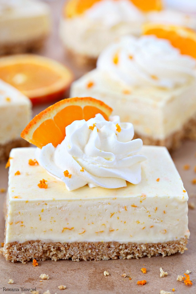 Summer in a bite, these orange dreamsicle pie bars are packed with orange flavor from freshly squeezed orange juice and grated orange rind! Forget the orange flavored jello, these orange dreamsicle pie bars taste so much better!