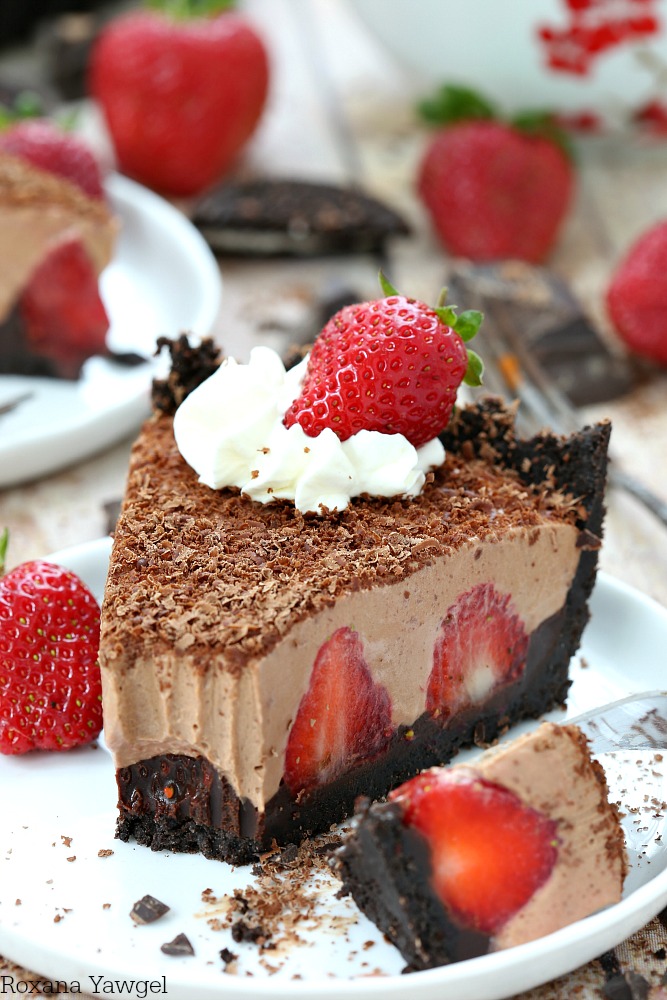 Chocolate crust, fresh strawberries, and a dreamy silky chocolate filling turn this easy and decadent no-bake strawberry chocolate pie into a showstopping dessert.