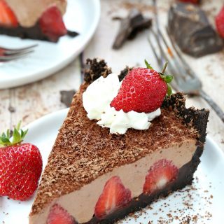 Chocolate crust, fresh strawberries, and a dreamy silky chocolate filling turn this easy and decadent no-bake strawberry chocolate pie into a showstopping dessert.